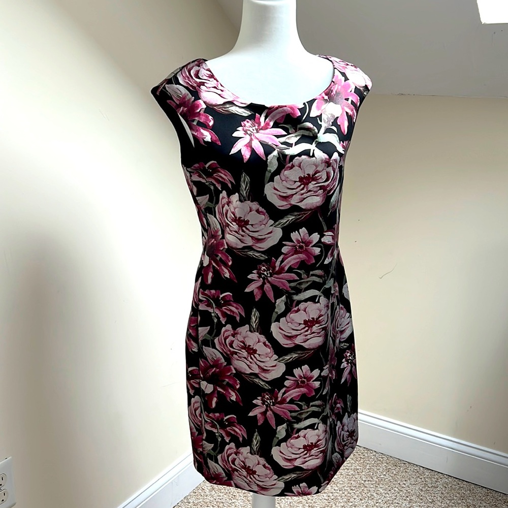 Rich, beautiful floral print addressed with black background. Size 10 P.